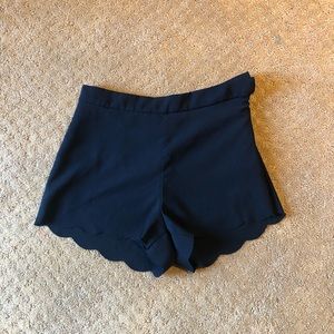 Black scalloped shorts